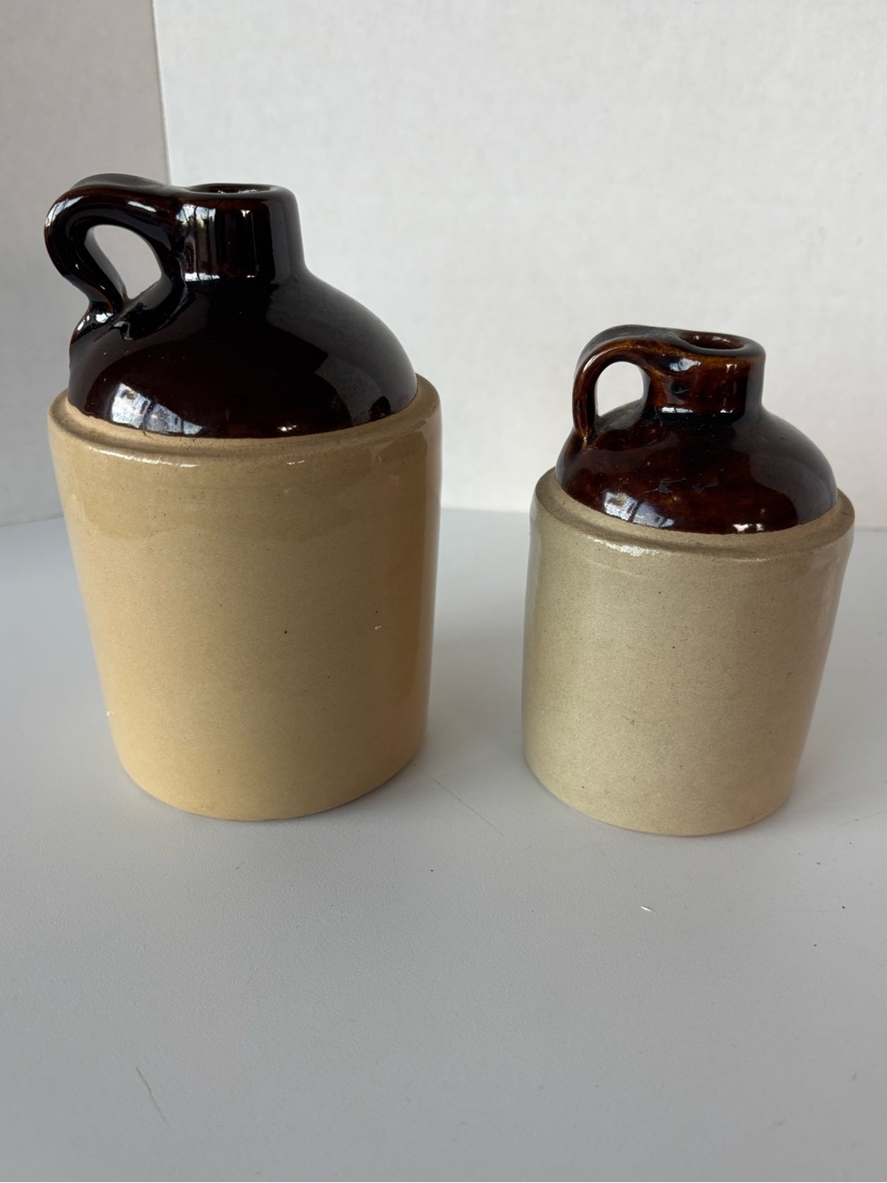 Pair of Vintage USA two-tone stoneware handled jugs or whiskey decanters